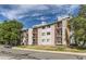Exterior view of the apartment complex with private balconies and manicured landscaping at 8635 Clay St # 417, Westminster, CO 80031