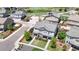 Attractive home with a manicured front yard and inviting porch in a well-planned neighborhood at 10016 Hough Pt, Parker, CO 80134