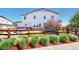 Landscaped backyard featuring a cozy patio with outdoor seating and a well-kept lawn at 10016 Hough Pt, Parker, CO 80134