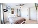 Inviting bedroom with ceiling fan and decorative artwork creating a personalized space at 10016 Hough Pt, Parker, CO 80134