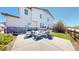 Back patio featuring a stylish seating area with comfortable furniture and a modern fire pit at 10016 Hough Pt, Parker, CO 80134