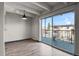 Bright dining area featuring a walk-out balcony with decorative railings and neighborhood views at 100 S Clarkson St # 303, Denver, CO 80209