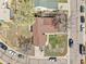 An aerial view showcasing the home's roof, surrounding yard, and neighborhood at 1255 Nelson St, Lakewood, CO 80215