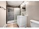 Modern bathroom with updated vanity, fixtures, and shower at 1255 Nelson St, Lakewood, CO 80215