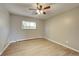Cozy bedroom with a ceiling fan and natural light at 1255 Nelson St, Lakewood, CO 80215