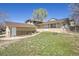 Charming single-Gathering home with a spacious front yard and well-maintained landscaping at 1255 Nelson St, Lakewood, CO 80215