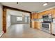Charming kitchen open to the living room, with stainless steel appliances at 1255 Nelson St, Lakewood, CO 80215