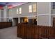 Townhouse exterior featuring a fenced patio, siding, and well-maintained landscaping at 1050 S Monaco Pkwy # 77, Denver, CO 80224