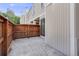 Fenced patio with concrete flooring, suitable for outdoor relaxation and dining at 1050 S Monaco Pkwy # 77, Denver, CO 80224