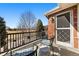 Relaxing balcony featuring outdoor seating and views of the green landscape across the street at 120 S Locust St, Denver, CO 80224