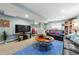 Cozy living room featuring plush seating, a flat-screen TV, and decorative accents at 120 S Locust St, Denver, CO 80224