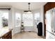 Bright breakfast nook with bay windows and a fruit stand, perfect for casual dining at 1314 Ascot Ave, Highlands Ranch, CO 80126