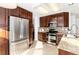 Spacious kitchen with stainless steel appliances and ample cabinet space at 1314 Ascot Ave, Highlands Ranch, CO 80126
