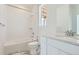 Modern bathroom featuring a shower/tub and vanity with light countertop at 2098 S Haleyville Way, Aurora, CO 80018