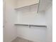 Walk-in closet featuring white walls and shelves at 2098 S Haleyville Way, Aurora, CO 80018