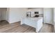Modern kitchen featuring stainless steel appliances and a kitchen island at 2098 S Haleyville Way, Aurora, CO 80018