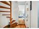 Picture of bedroom as seen from the hallway, featuring wood floors and a blue color scheme at 39 Pat Creek Rd, Evergreen, CO 80439