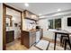 Efficient kitchenette with modern appliances, compact design and adjacent bathroom at 39 Pat Creek Rd, Evergreen, CO 80439