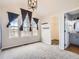 Bright bedroom features ample natural light and a convenient walk-in closet at 9813 E Carolina Pl, Aurora, CO 80247