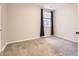Simple bedroom featuring neutral walls and carpet, providing a blank canvas for personalization and comfort at 9813 E Carolina Pl, Aurora, CO 80247