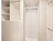 Organized walk-in closet with ample shelving and hanging space for efficient storage and organization at 9813 E Carolina Pl, Aurora, CO 80247