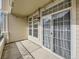 Patio with sliding glass doors and plenty of room for entertaining at 9813 E Carolina Pl, Aurora, CO 80247