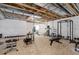Unfinished basement gym area, offering plenty of space for a variety of workout equipment at 9996 Sedalia St, Commerce City, CO 80022