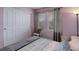 A bedroom features a double window and ample closet space at 9996 Sedalia St, Commerce City, CO 80022