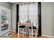 Cozy breakfast nook features a small table with seating and views of the outdoors at 9996 Sedalia St, Commerce City, CO 80022