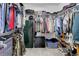 Walk-in closet with shelving offering ample storage space at 9996 Sedalia St, Commerce City, CO 80022
