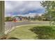 View of the street and neighborhood, showcasing the well-maintained lawns and quiet atmosphere at 9996 Sedalia St, Commerce City, CO 80022