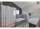 Modern bathroom with a soaking tub, elegant tile work, and dual sinks at 36545 Winchester Rd, Elizabeth, CO 80107