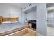 Cozy bedroom featuring a wooden bed frame and piano nook at 36545 Winchester Rd, Elizabeth, CO 80107