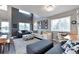 Bright living room featuring neutral tones, large windows, and modern decor throughout at 36545 Winchester Rd, Elizabeth, CO 80107