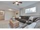 Comfortable living room with a large sectional sofa and a rustic coffee table at 36545 Winchester Rd, Elizabeth, CO 80107