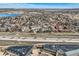 Wide aerial view showing the town, lakes, traffic, commercial buildings, and residential areas at 3228 47Th, Boulder, CO 80301