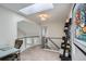 Upstairs hallway area with a skylight and a desk perfect for a small office at 3228 47Th, Boulder, CO 80301