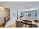 Well-lit kitchen with stainless appliances, gray cabinets, and open design to dining area at 3228 47Th, Boulder, CO 80301