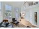 The large living space features hardwood floors, plenty of natural light, and a staircase to the second floor at 3228 47Th, Boulder, CO 80301