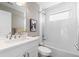 Modern bathroom with white subway tiles and updated fixtures at 5370 Pine Ridge Rd, Golden, CO 80403