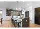 Contemporary kitchen with white cabinetry, wood countertops, and a farmhouse sink at 5370 Pine Ridge Rd, Golden, CO 80403