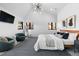 Main bedroom with vaulted ceiling, mountain views, and mid-century modern furniture at 5370 Pine Ridge Rd, Golden, CO 80403