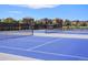 Outdoor tennis courts ready for a tennis match at 7965 S Vandriver Way, Aurora, CO 80016