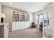 Office with built-in shelving and window at 8888 Falcon St, Longmont, CO 80504