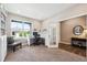 Office with built-in shelving, window, and desk at 8888 Falcon St, Longmont, CO 80504