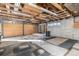 Large garage with double doors and additional storage at 7674 Stuart St, Westminster, CO 80030