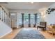 Bright and open living room with hardwood floors and modern decor at 8136 Washington St # 141, Denver, CO 80229