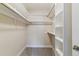 Bright walk-in closet featuring ample storage space with shelving and hanging rods at 610 S Clinton St # 3D, Denver, CO 80247