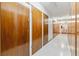 Hallway featuring row of wooden storage units, for residents at 610 S Clinton St # 3D, Denver, CO 80247