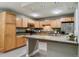 A bright kitchen with stainless steel appliances, recessed lighting, and ample counter space for cooking at 610 S Clinton St # 3D, Denver, CO 80247